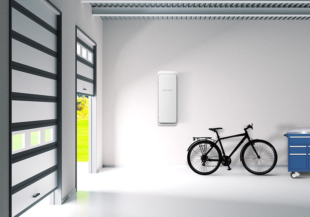 SPAN smart panel installed on garage wall in modern home, providing circuit-level energy control and monitoring in Southern California