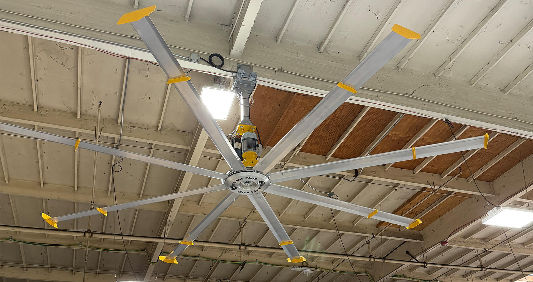 HVLS ceiling fan installed in warehouse for heat mitigation and air circulation in Southern California facility