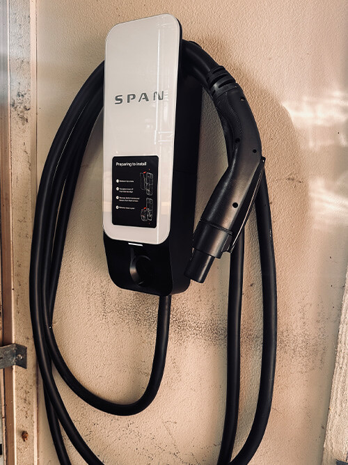 SPAN EV charger mounted in residential garage for home electric vehicle charging in Southern California